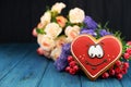 Beautiful card with a red heart smiley cookies on the background Royalty Free Stock Photo