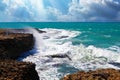 Beautiful caribbean coastal landscape with splashing waves, rough rocky coastline, storm clouds, sun rays - Treasure Beach, Royalty Free Stock Photo