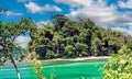 Beautiful caribbean island beach lagoon, white sand, turquoise water, green forest trees - Port Antonio, San San Beach, Jamaica