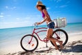 Beautiful caribbean woman with bicycle