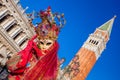 Beautiful carnival mask on San Marco square in Venice, Italy