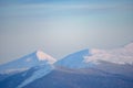 Beautiful Carpathian Mountains in Fog. Winter Sunset Landscape. Hoverla Mountain, Ukraine.