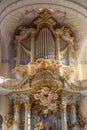 Beautiful carved gilded organ in the Frauenkirche church in Dresden, Germany