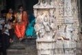 Beautiful carvings on a stone pillar at the ancient Hindu temple of Jalakandeswarar