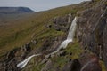 Beautiful cascade waterfall Bleiksarfoss in Eskifjordur, east of Iceland