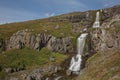 Beautiful cascade waterfall Bleiksarfoss in Eskifjordur, east of Iceland