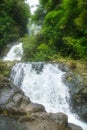 Beautiful cascade waterfall hidden in a forest. Adventure and travel concept. Nature background. Kaiate Falls, Bay of Royalty Free Stock Photo