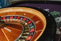 Beautiful casino roulette close-up with playing chips