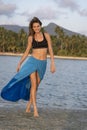 Beautiful caucasian brunette girl on the tropical beach in sea water, Thailand. Nature and summer concept Royalty Free Stock Photo