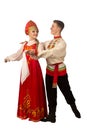 Beautiful caucasian cuple dancing in Russian folk costumes isolated on white Royalty Free Stock Photo