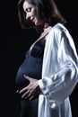 Beautiful caucasian pregnant woman in nightie Royalty Free Stock Photo