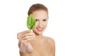 Beautiful caucasian topless woman with one green leaf. Royalty Free Stock Photo