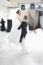 Beautiful caucasian wedding couple just married and dancing their first dance Royalty Free Stock Photo