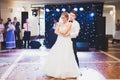 Beautiful caucasian wedding couple just married and dancing their first dance Royalty Free Stock Photo