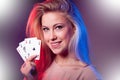 Beautiful caucasian woman with poker cards gambling in casino Royalty Free Stock Photo