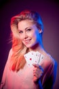 Beautiful caucasian woman with poker cards gambling in casino Royalty Free Stock Photo