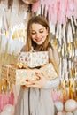 Beautiful Caucasian woman smiles  Christmas presen Royalty Free Stock Photo