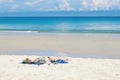 Beautiful Caucasian Woman Sunbathing On The Beach.Young Woman Resting On Sand At Tropical Beach