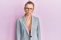 Beautiful caucasian woman wearing business jacket and glasses skeptic and nervous, frowning upset because of problem Royalty Free Stock Photo