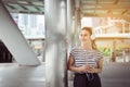 Beautiful caucasian young woman using headphone and listening to music outdoor,Happy and smiling,Positive thinking Royalty Free Stock Photo