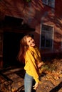 Beautiful caucasian young woman walking and having fun outdoors in autumn time Royalty Free Stock Photo