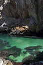 Beautiful cave with shallow azure waters