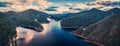 Beautiful Cethana lake and surrounding forest aerial panorama. Royalty Free Stock Photo