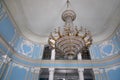 A beautiful chandelier in the ballroom of an abandoned estate. Royalty Free Stock Photo