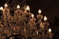 Beautiful chandelier with elaborate crystals in a dark room