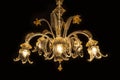 Beautiful chandelier (Murano Italy) isolated on black background.