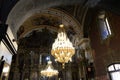 Beautiful chandeliers in an Orthodox church with beautiful frescoes