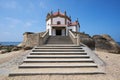 Beautiful chapel on the beach Capela do Senhor da Pedra in Miramar, in Portugal