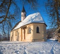 Beautiful chapel St Georg, at Weinberg hill schliersee, winter landscape bavaria