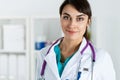 Beautiful charming friendly smiling female medicine therapeutist doctor Royalty Free Stock Photo