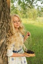 Beautiful charming long curly blonde hair teenage girl wearing a Royalty Free Stock Photo