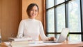 Asian businesswoman or female financial analysts working at her office desk Royalty Free Stock Photo