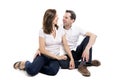 Beautiful and Cheerful couple sitting on floor Royalty Free Stock Photo