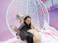 Beautiful cheerful little girl playing pleasure ground on playground Royalty Free Stock Photo