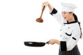 Beautiful chef holding a wooden spatula