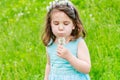 Beautiful child girl in park. Happy kid having fun outdoo Royalty Free Stock Photo