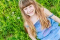 Beautiful child girl in park. Happy kid having fun outdoo Royalty Free Stock Photo