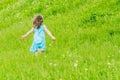 Beautiful child girl in park. Happy kid having fun outdoo Royalty Free Stock Photo