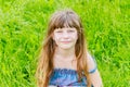 Beautiful child girl in park. Happy kid having fun outdoo Royalty Free Stock Photo