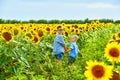 Beautiful children in the field with sunflowers Royalty Free Stock Photo