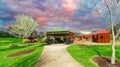 ChildrenÃ¢â¬â¢s park playground in Suburban Melbourne Victoria Australia. Lovely green grass and nice sunset colours in the sky