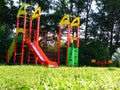 Beautiful children`s Playground. Swings, slides and other entertainment are waiting for children in this place. Details and close-