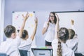 Beautiful children are students together in a classroom in school get the education with the teacher Royalty Free Stock Photo