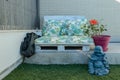 Beautiful Chillout Decoration Composed Of A Sofa Made With Wooden Pallets A Hibiscus And A Smiling Buddha. September 28, 2019. Royalty Free Stock Photo