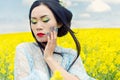 Beautiful Chinese girl in kimono with long false nails with red lipstick in Royalty Free Stock Photo