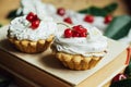 Beautiful chocolate cupcakes with white protein cream and cherry Royalty Free Stock Photo